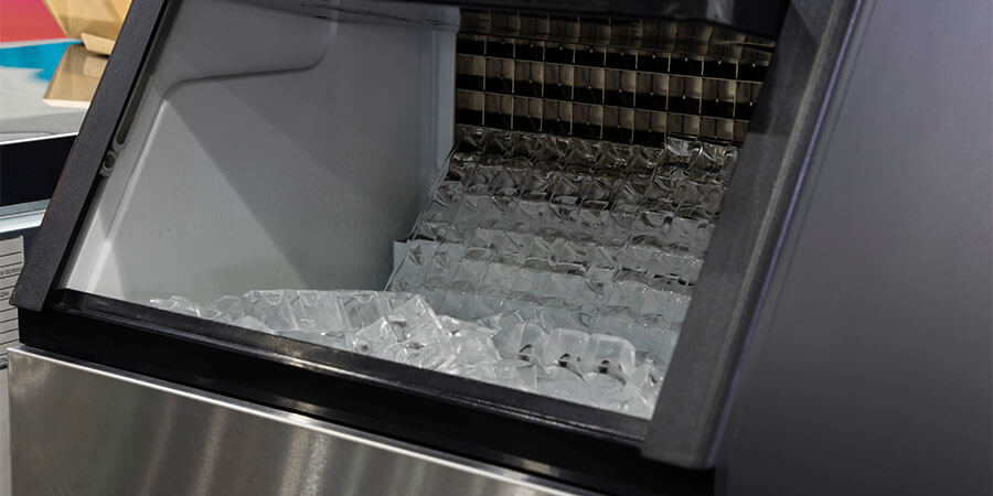 Ice machine with ice cubes inside