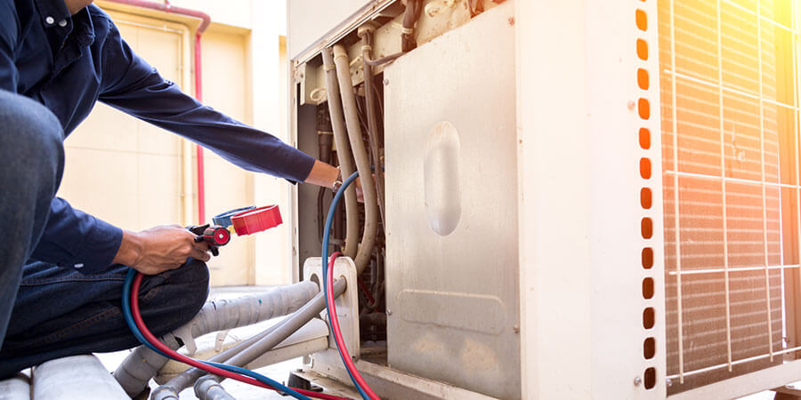 Technician working on commercial unit